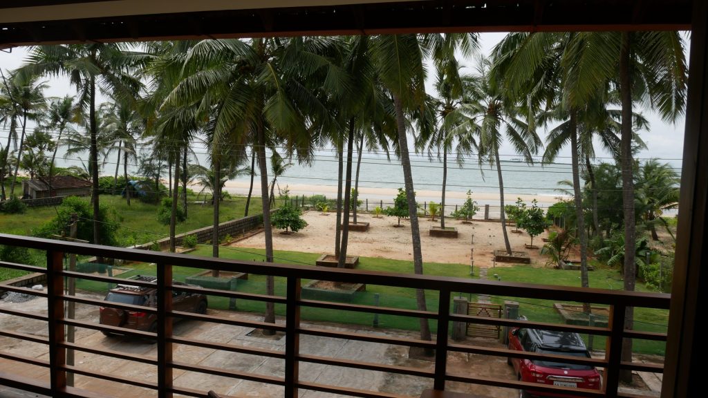 Balcony view of ocean and garden